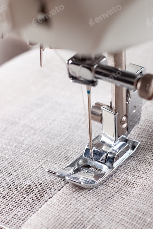 Preview: Modern Sewing Machine Presser Foot With Linen Fabric And Thread, Closeup