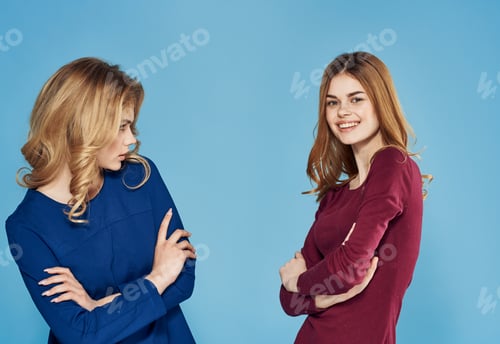 Preview: two pretty women in dresses elegant communication style friendship cropped view