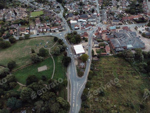 Preview: Aerial shot of the town of Stowmarket, Suffolk, UK, featuring a winding road
