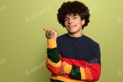 Preview: Cheerful black man with raised arms