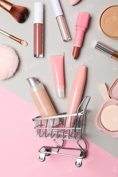 Preview: Golden shopping basket with pink makeup accessories