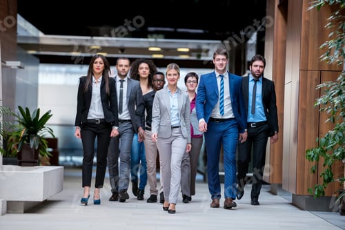 Preview: Young Multi Ethnic Business People Group Walking Standing And Top View