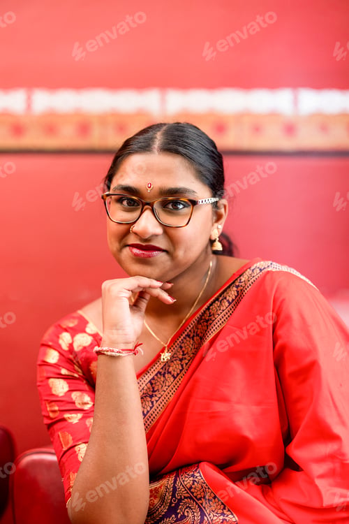 Preview: portrait of pretty young indian woman wearing traditional clothes