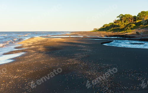 Preview: Sunset time on an empty sea beach