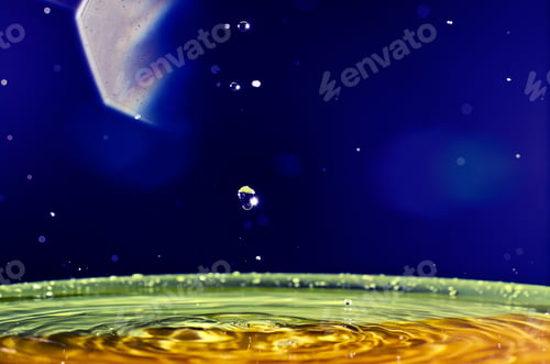 Preview: The water drop with interesting colorful blurred background