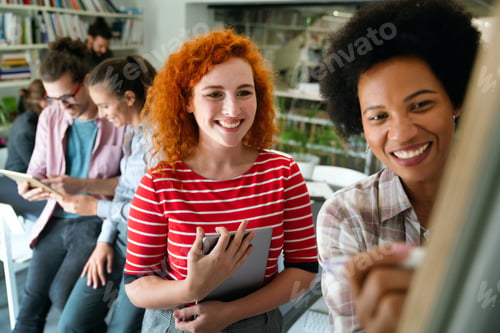Preview: Group of young multiracial business people are working together in modern office. Freelancer concept