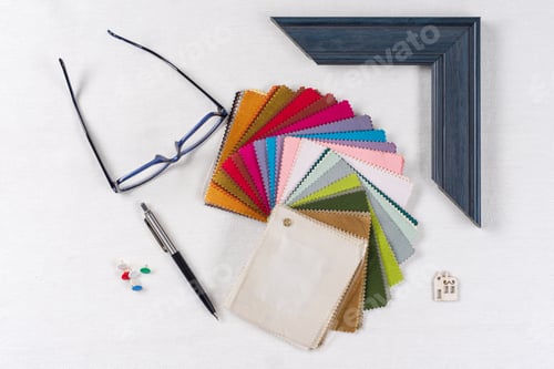 Preview: Home renovation. Workplace of the architect, designer with drawings, samples of decorative materials