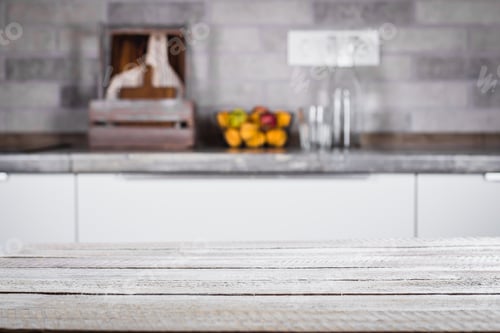 Preview: Wooden table on background of kitchen room. Place for object, text.