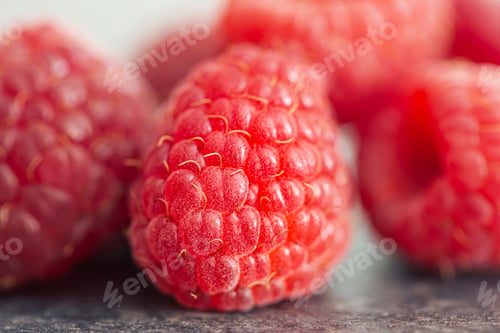 Preview: Ripe raspberries macro shot, selective focus, fruit background.