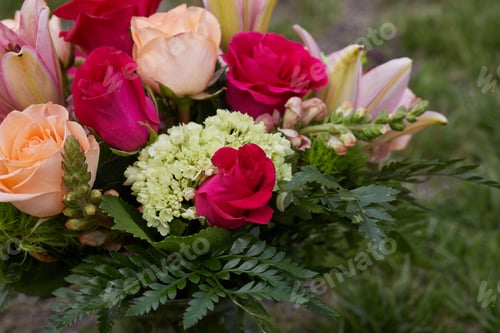 Preview: Close-up photo of bunch of colorful flowers in a vase