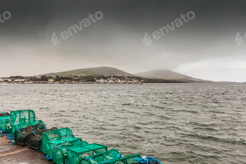 Preview: Lobster pots on harbor wall at Cahersiveen, County Kerry, Ireland