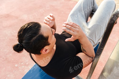 Preview: Concentrated handsome young strong sports man