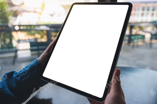 Preview: Mockup image of a woman holding digital tablet with blank white desktop screen