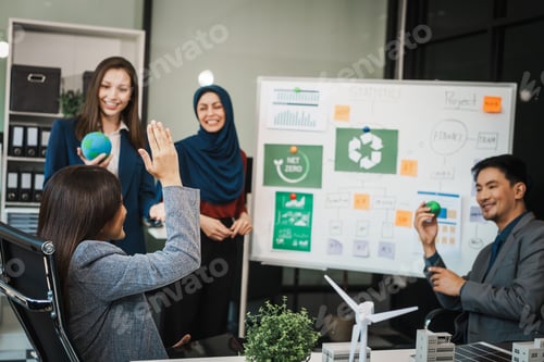 Preview: Diverse team, middle-aged Asian businessman, Caucasian young businesswoman, Muslim hijab-wearing