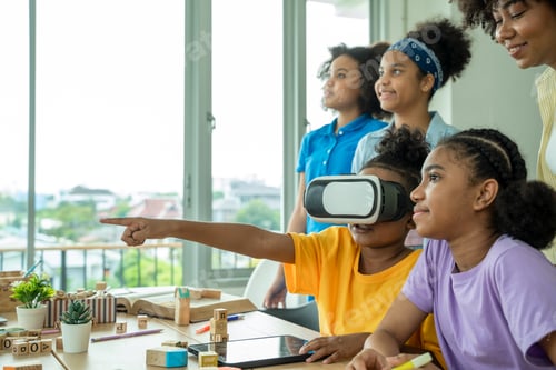 Preview: African American elementary school children gesturing while wearing VR glasses in classroom.