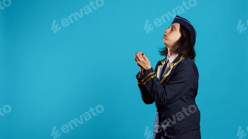 Preview: Young adult dressed as air hostess applauding