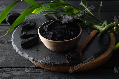 Preview: Natural wood or hardwood charcoal on wooden table