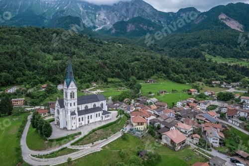 Preview: Drežnica village, Slovenia. Drone aerial view. Picturesque rural green landscape