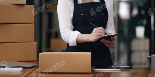 Preview: Entrepreneurs Small Business SME Independent men work at home Use smartphones and laptops for