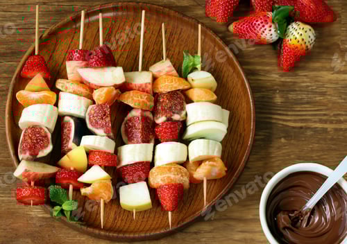 Preview: Delicious Fruit Skewers Served With Chocolate Dip
