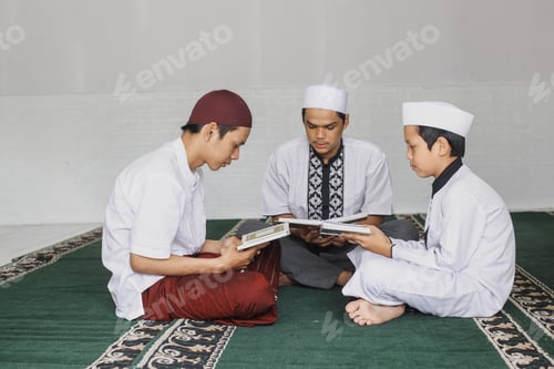 Preview: Group of muslim reading Quran at mosque