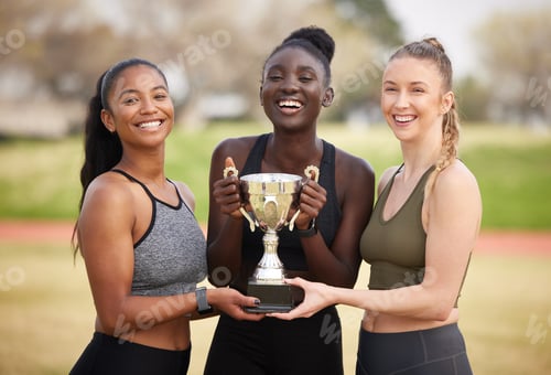 Preview: Cropped portrait of three attractive young female athletes celebrating their victory