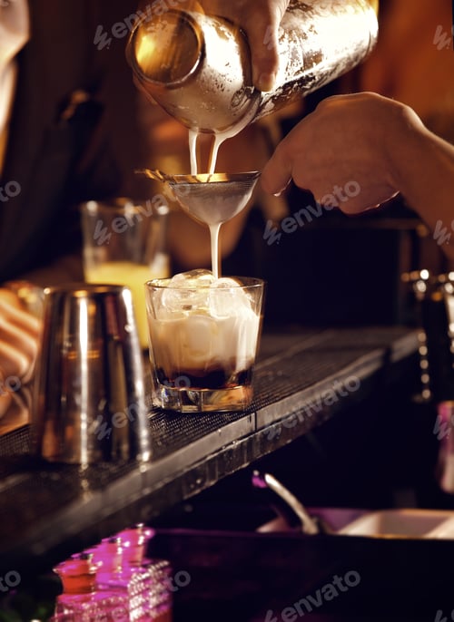 Preview: Bartender Making a Cold Cocktail Drink
