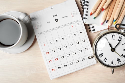 Preview: Desk setup featuring coffee, calendar, clock, and colored pencils in a productive workspace