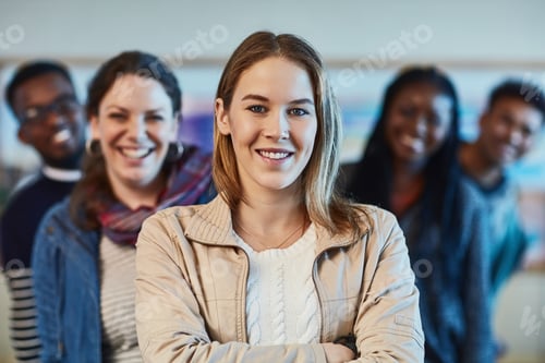 Preview: Portrait of a group of university students standing together at campus