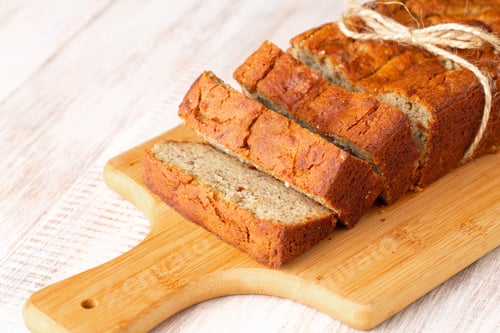 Preview: Rustic Loaf Of Gluten Free Banana Bread On Wood Cutting Board