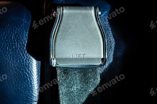 Preview: Safety lock of an airplane belt, isolated.