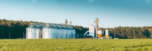Preview: View Modern Granary, Grain-drying Complex, Commercial Grain Or Seed Silos In Sunny Spring Rural