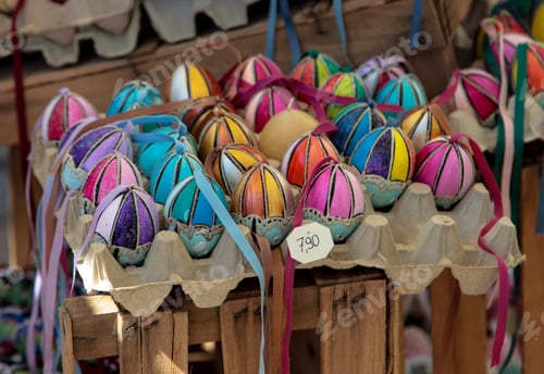 Preview: colorful painted easter eggs in basket at the traditional European market