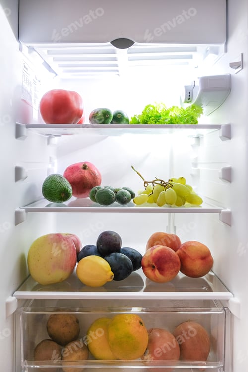 Preview: open fridge with fresh fruits and vegetables. refrigerator with healthy food.Healthy food concept