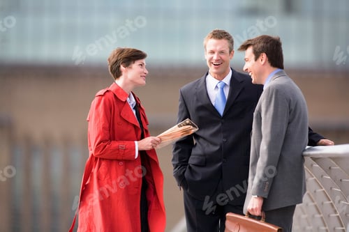 Preview: Business people talking outdoors