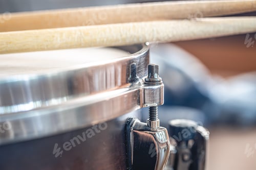 Preview: Close-up, drumsticks on a blurred background.