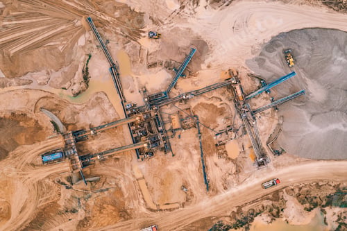 Preview: Aerial top view of open pit development and sand extraction. Mining industry Reserves