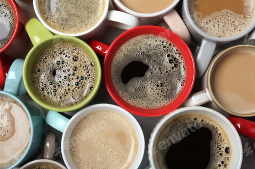 Preview: Many cups with tasty aromatic coffee on table, flat lay