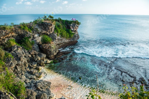 Preview: Rock crashes into the sea on Balangan beach, Bali island