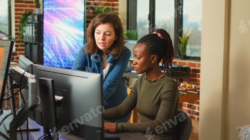 Preview: People doing teamwork to develop new interface in agency office
