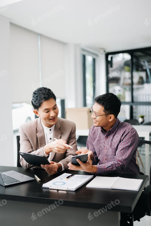 Preview: Portrait of success business people working together in office. Couple teamwork startup concept