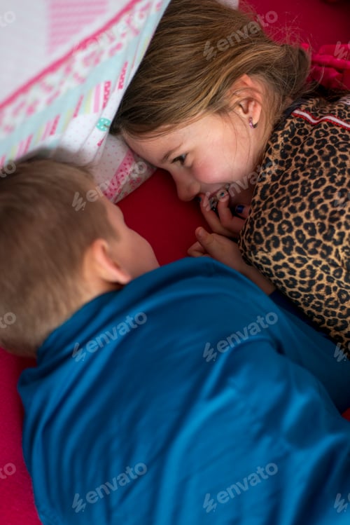 Preview: Two children sharing a joyful moment