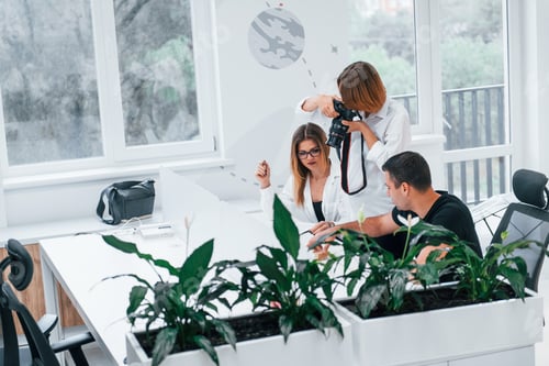 Preview: Group of business people in formal clothes indoors in the office