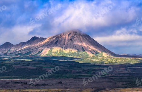 Preview: Majestic mountain landscape with cloud-covered peak.