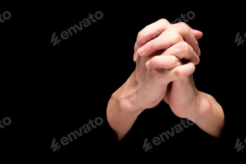 Preview: Male hands on a black background. Free space for text