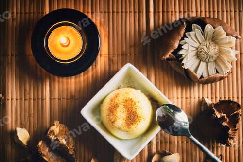 Preview: Vanilla pudding on a wood table