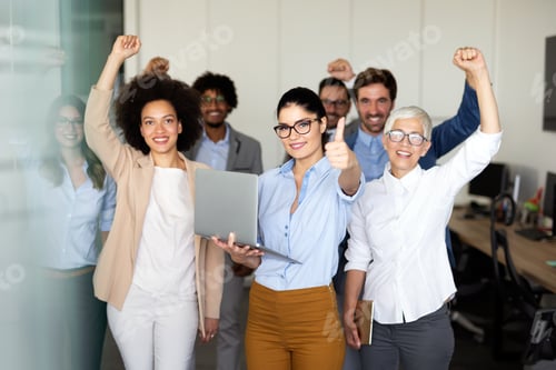Preview: Success group of multiethnic entrepreneurs and business people achieving goals in corporate office
