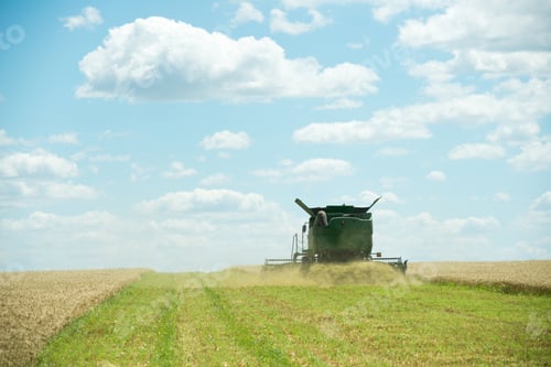 Preview: modern combine harvester working on a wheat crop