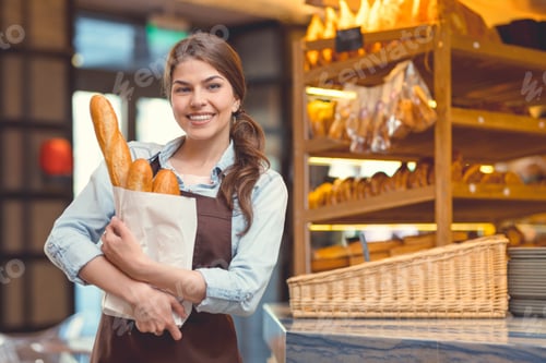 Preview: Young woman with baguettes