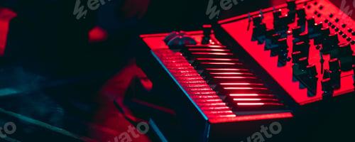 Preview: Close-up of musicial equipment for performing in neon light. Concept of advertising, hobby, music